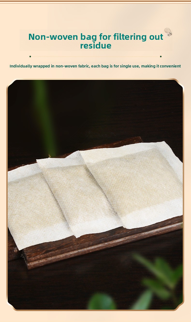 Three non-woven sachets on a wooden tray