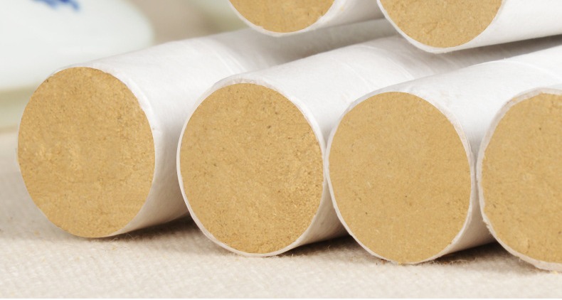 Golden wool ends of tightly rolled white-paper rolls (manufacturer detail photo).