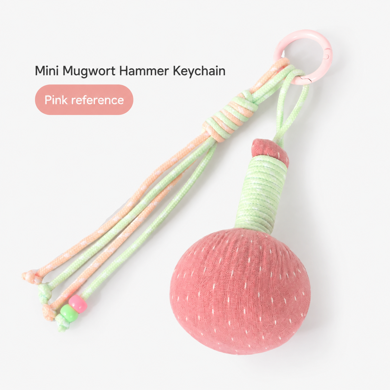 Mini Mugwort Wellness Hammer Keychain — Pink Reference; identifying text removed from source reference image.