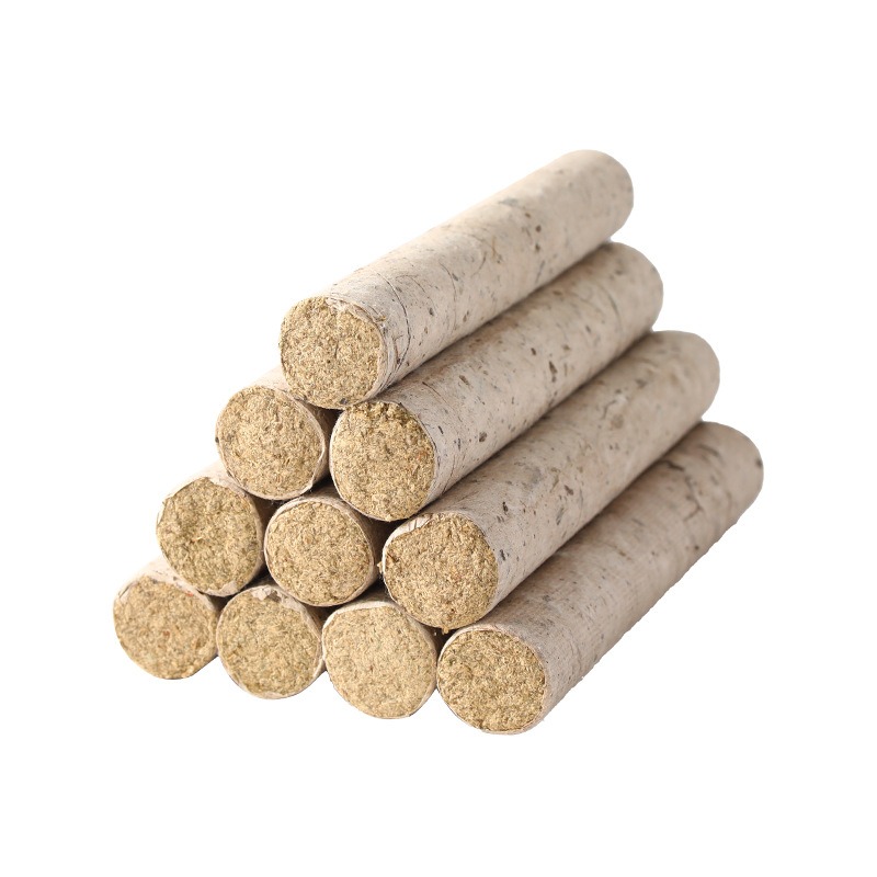 Stone-milled moxa rolls stacked on a white background